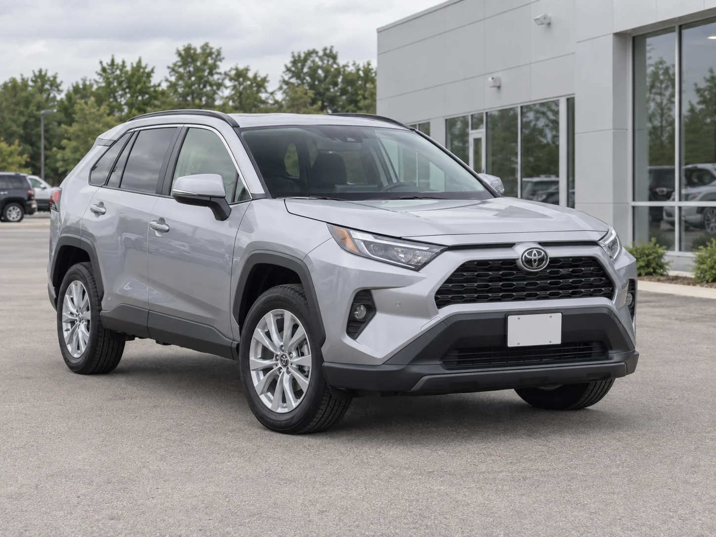 Illustrative silver Toyota RAV4 in the vehicle card demo
