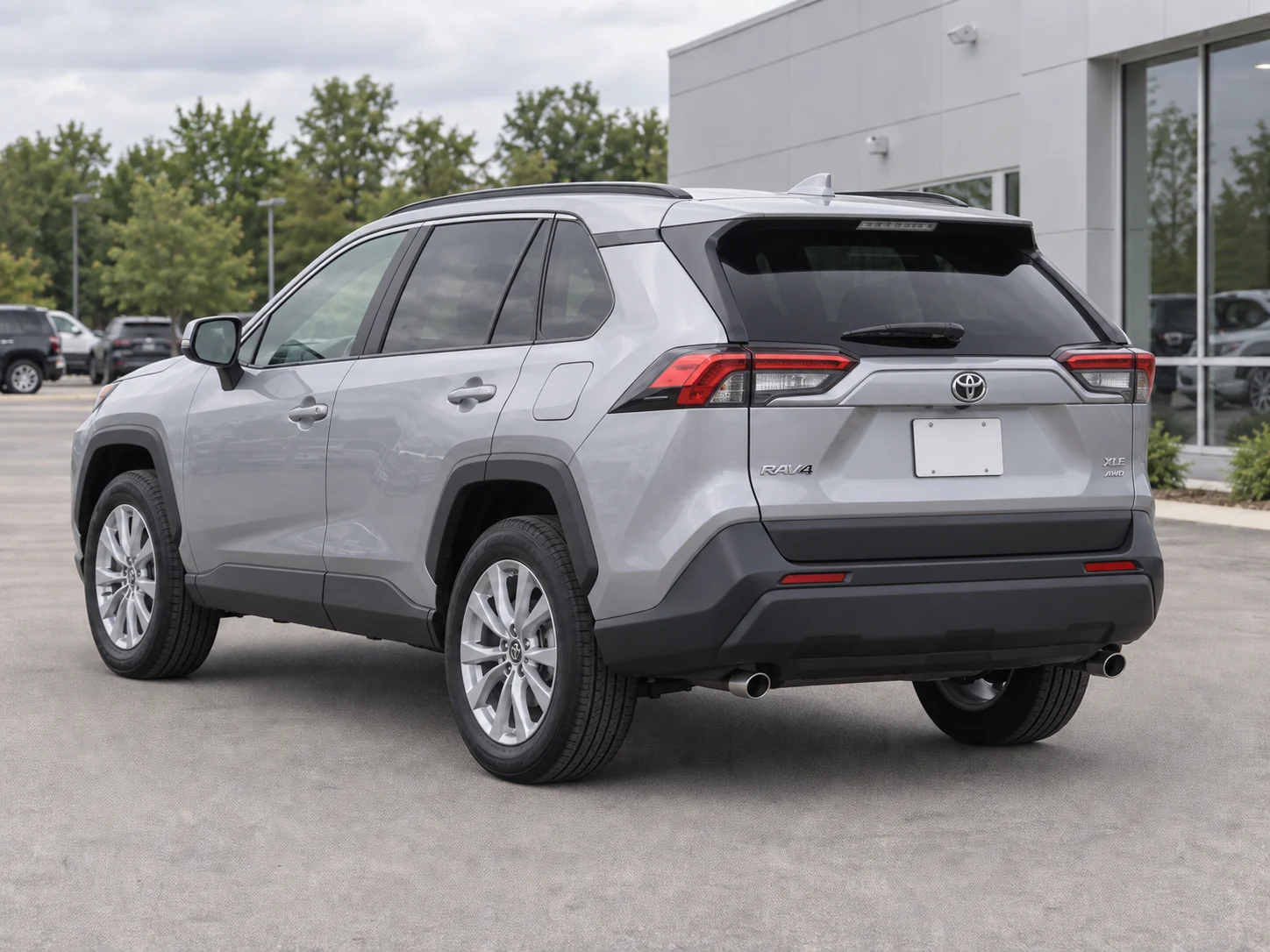 Rear three-quarter exterior view of the sample Toyota RAV4, AI-generated illustration